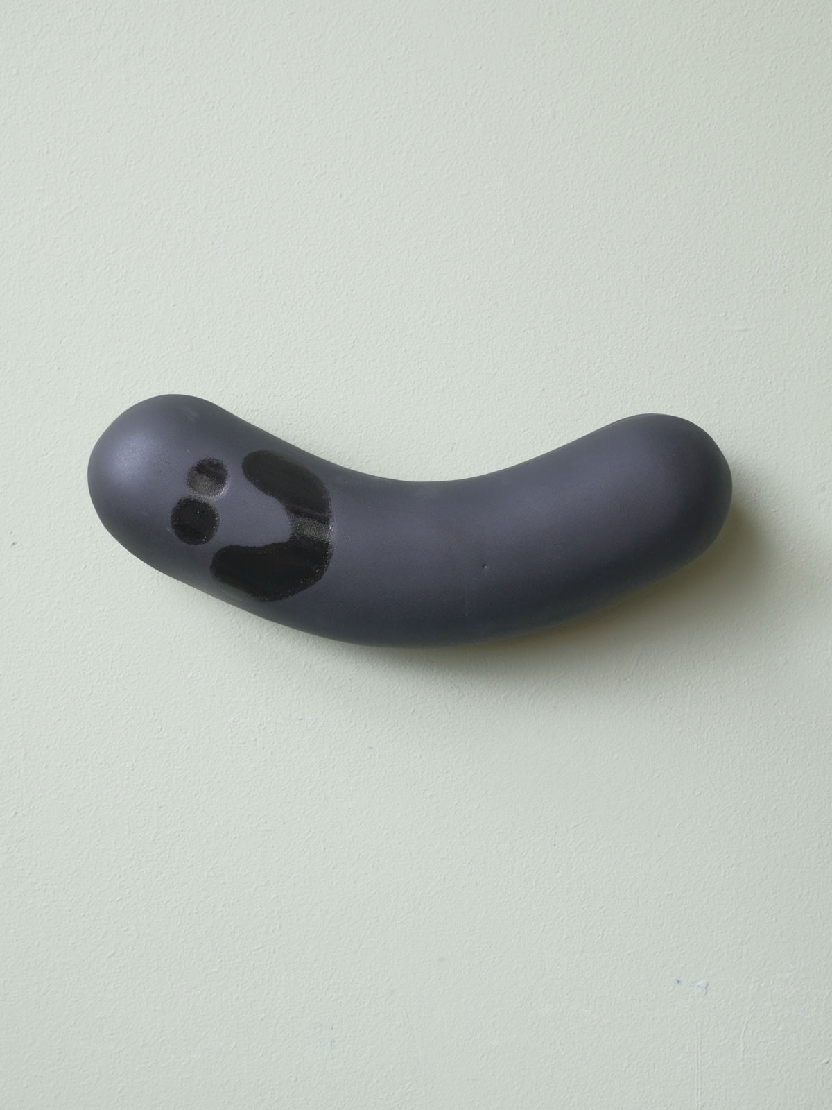 Wall Sausage - Mustamakkara Smile